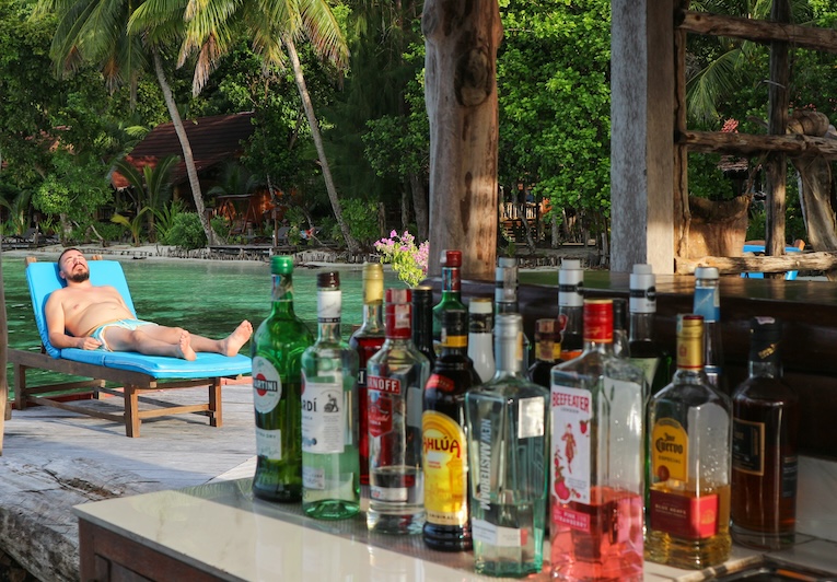 Tourist on sunlounger,  Resort Raja Ampat